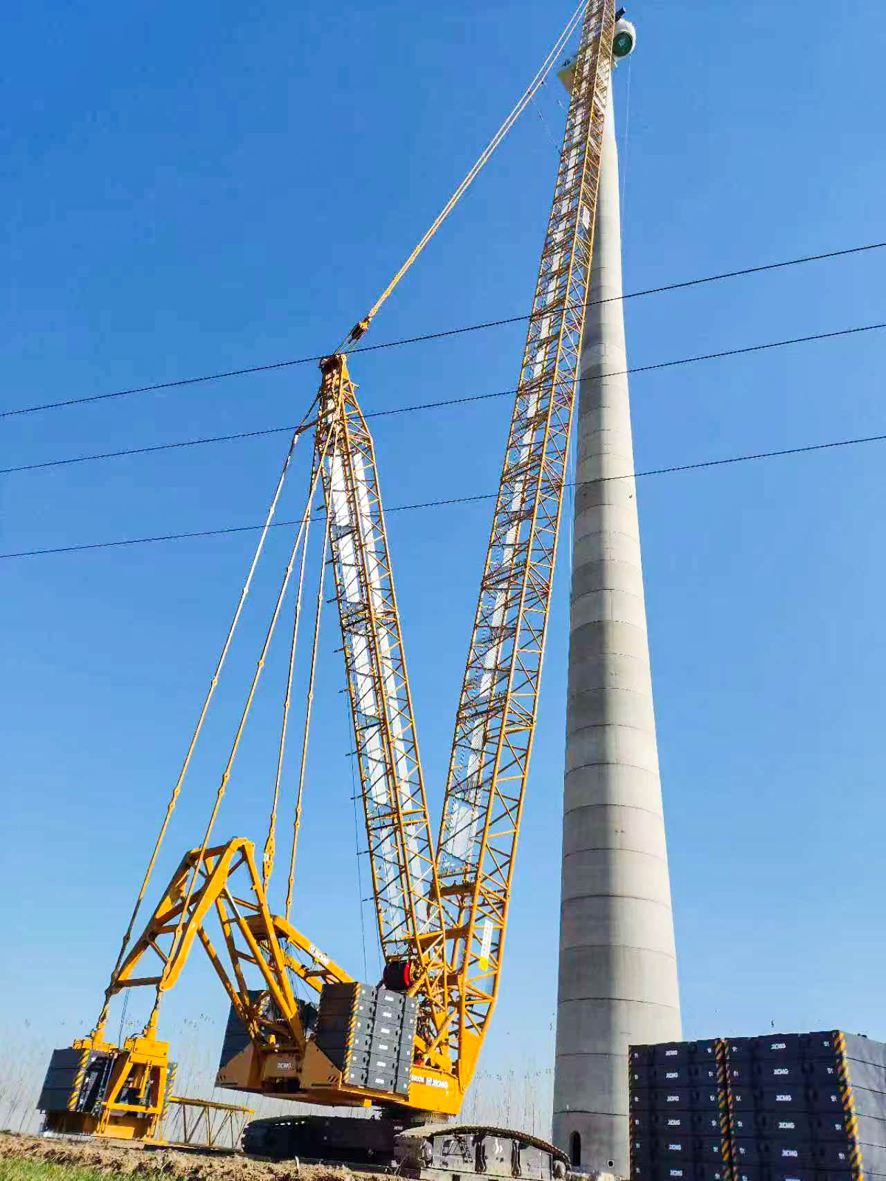 160米高空精准“搭积木”：开云网页版登录入口XLC15000M分体吊装6.25兆瓦风机全纪录